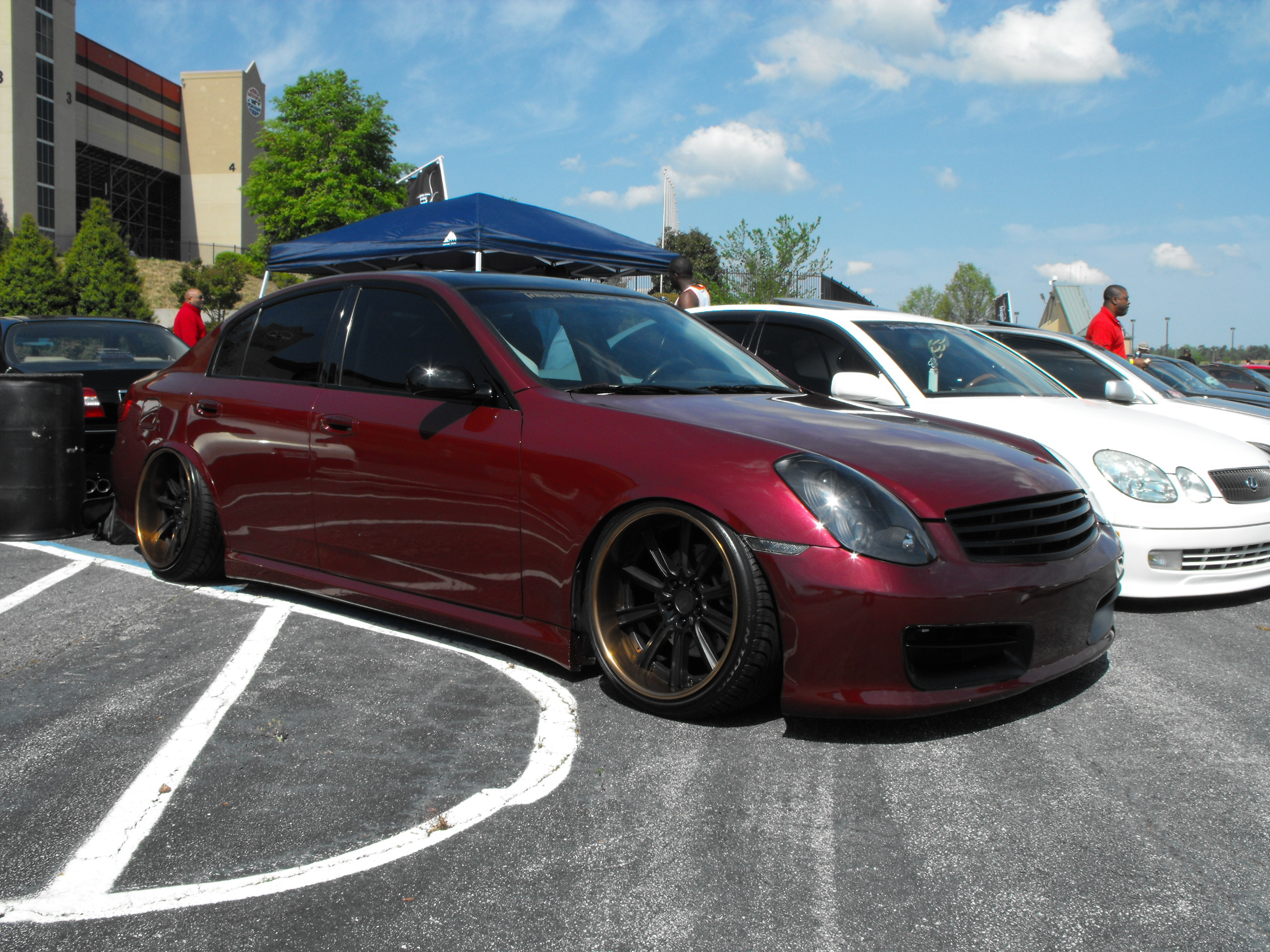 Burgundy paint and bronze lips make this wheel choice pop on this G35